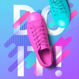 A pink shoe and a sky blue shoe on top of a cool art piece